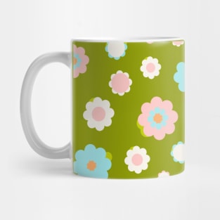 White, blue and pink flowers over green background Mug